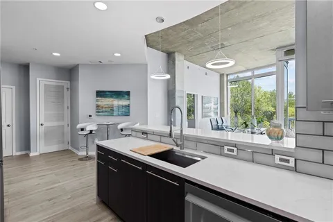 a kitchen with a stove and a microwave