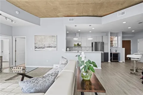 a living room with furniture and a table