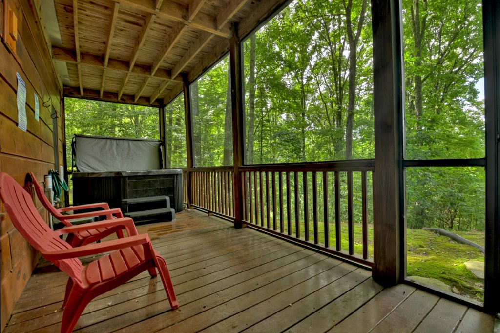 548 Mountain Highlands Court Blue Ridge, GA 30513 - Photo 30 of 33 a sitting area with furniture on wooden deck