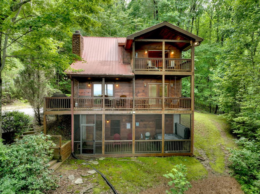 548 Mountain Highlands Court Blue Ridge, GA 30513 - Photo 33 of 33 a view of a house with yard and balcony