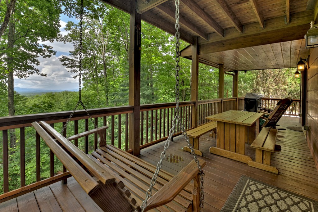 548 Mountain Highlands Court Blue Ridge, GA 30513 - Photo 10 of 33 a view of a two chairs in the balcony