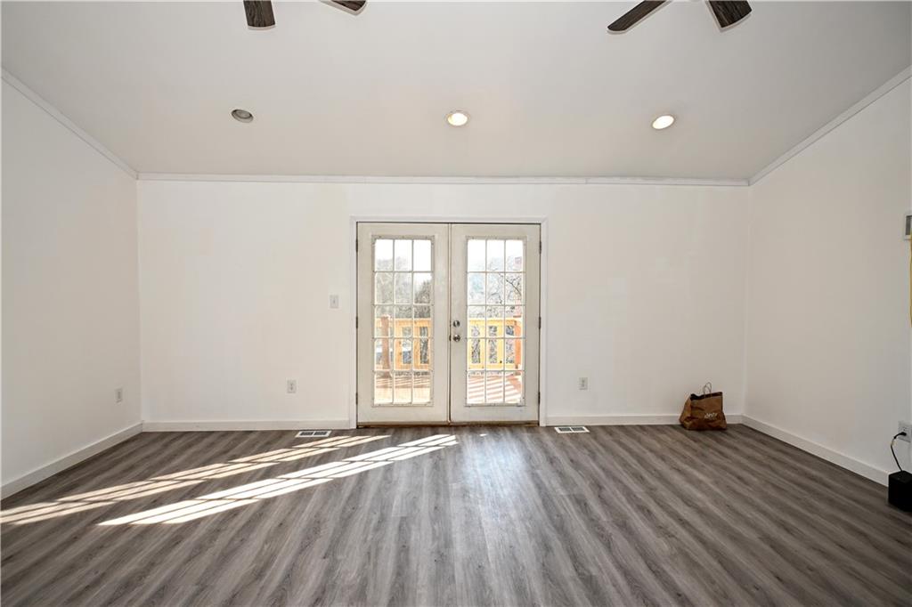 42 Kennedy Road Finleyville, PA 15332 - Photo 14 of 45 This livingroom has great lighting, french doors to the rear deck with a unique river view.