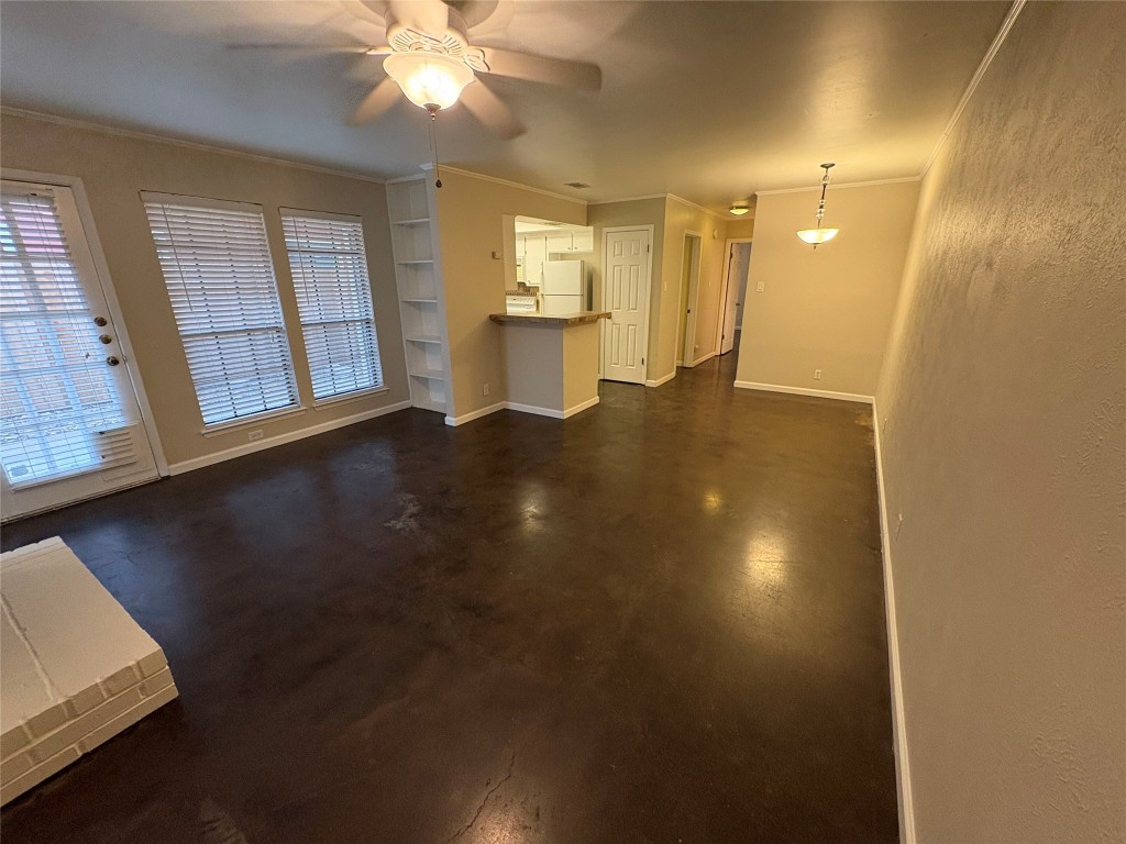 8713 Clearbrook Trail, Unit A Austin, TX 78729 - Photo 6 of 22 a view of a kitchen with a sink and a window
