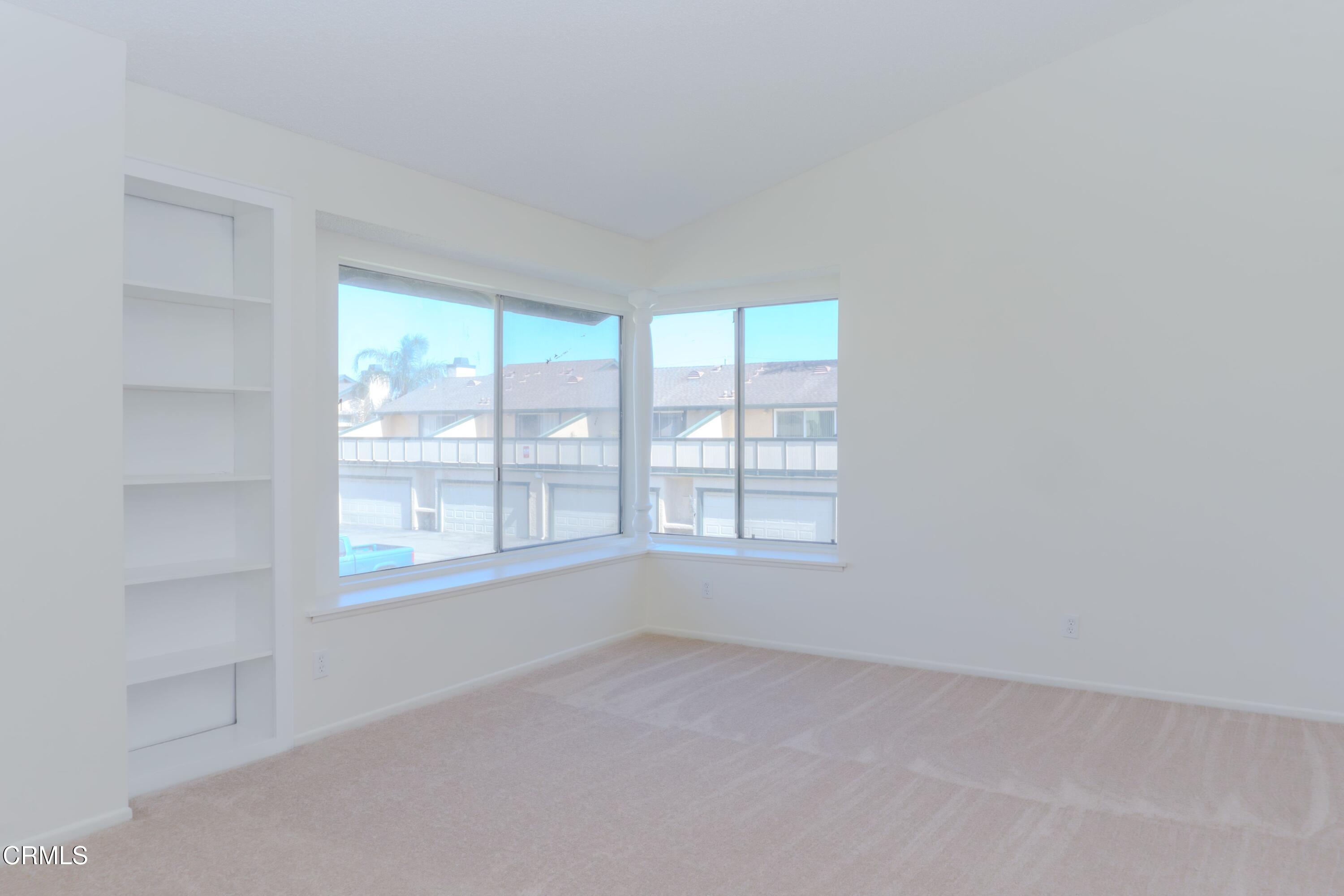 5313 Perkins Road Oxnard, CA 93033 - Photo 25 of 40 an empty room with a window