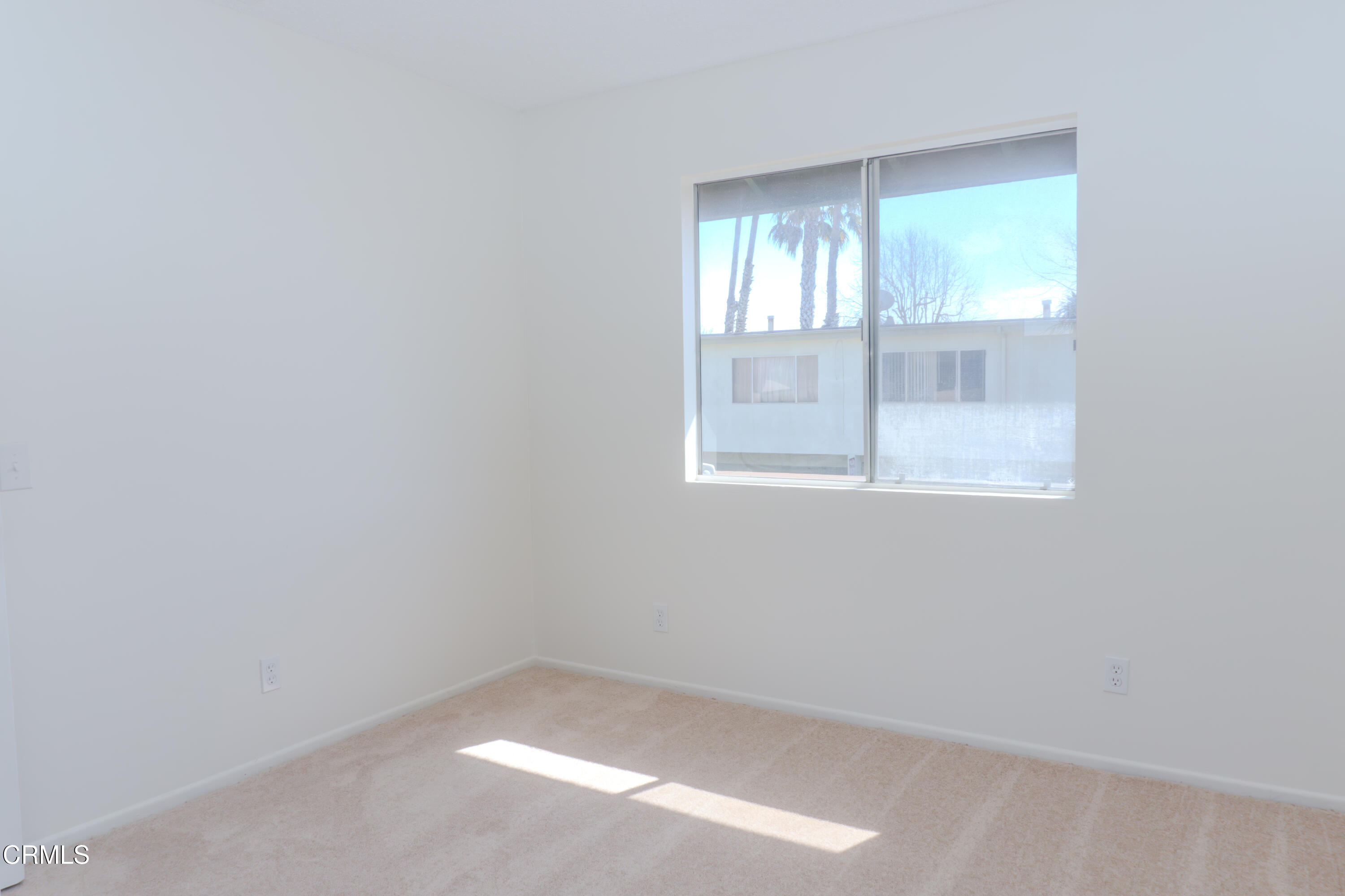 5313 Perkins Road Oxnard, CA 93033 - Photo 29 of 40 an empty room with a window