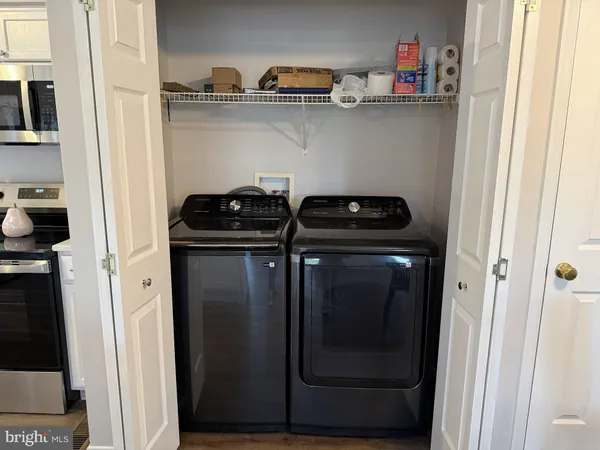 a close view of a stove and cabinets