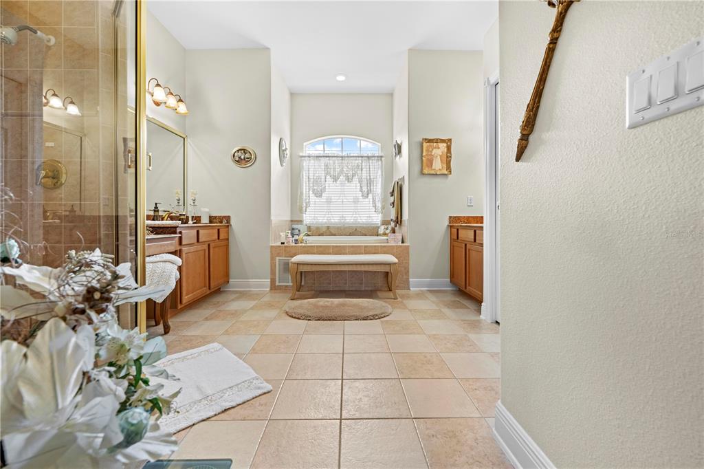 1245 Coble Road Spring Hill, FL 34608 - Photo 16 of 50 a living room with furniture and a fireplace