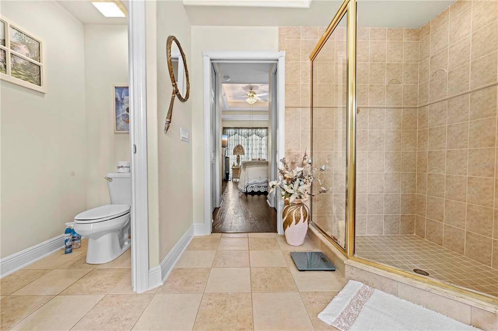 1245 Coble Road Spring Hill, FL 34608 - Photo 20 of 50 a bathroom with a toilet and a shower