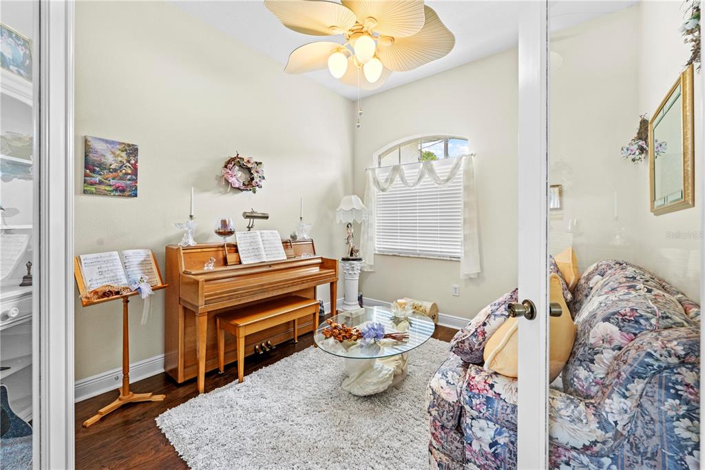 1245 Coble Road Spring Hill, FL 34608 - Photo 23 of 50 a living room with furniture and a window