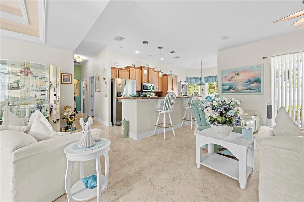 1245 Coble Road Spring Hill, FL 34608 - Photo 25 of 50 a living room with furniture and a table