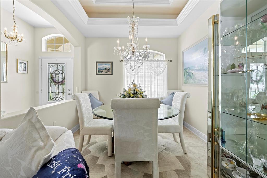 1245 Coble Road Spring Hill, FL 34608 - Photo 31 of 50 a dining room with furniture and window