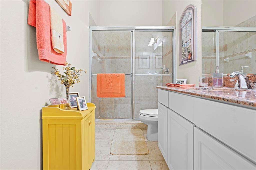 1245 Coble Road Spring Hill, FL 34608 - Photo 42 of 50 a bathroom with a sink toilet and shower