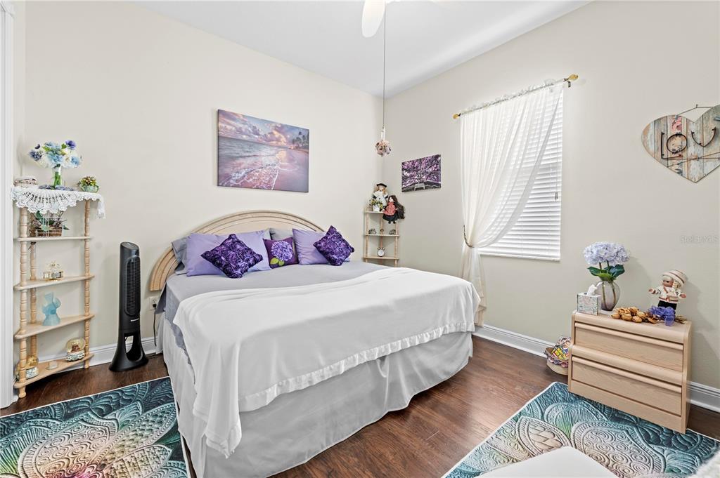 1245 Coble Road Spring Hill, FL 34608 - Photo 43 of 50 a bedroom with a bed and a window