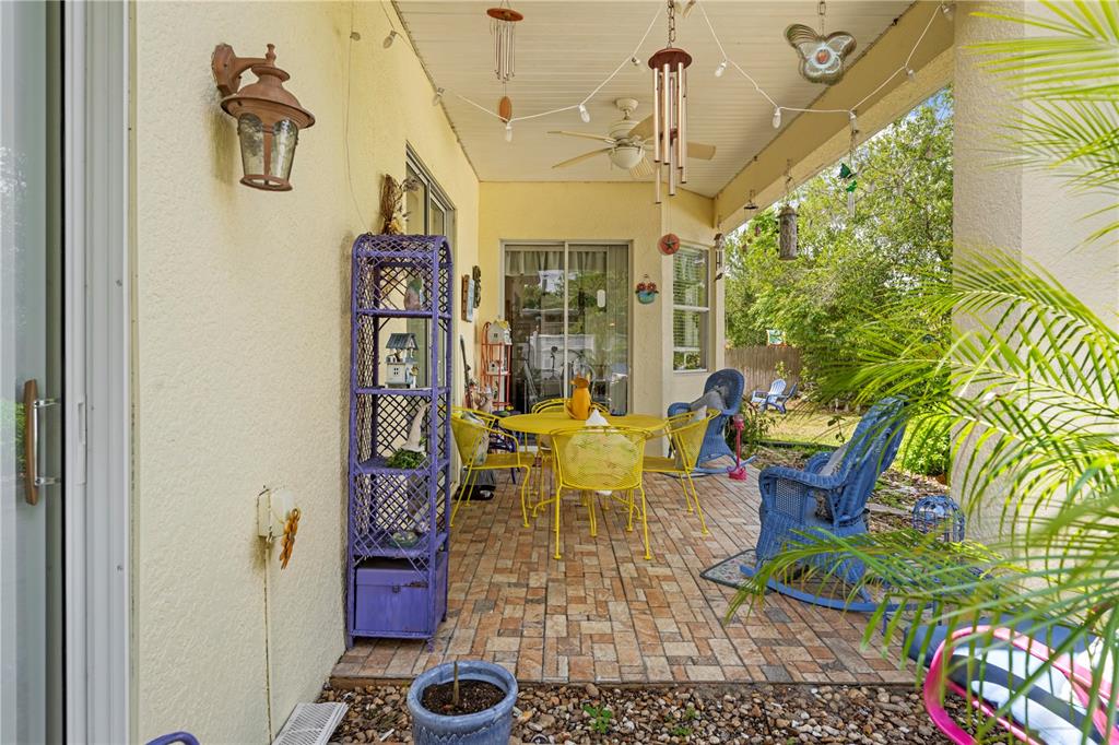 1245 Coble Road Spring Hill, FL 34608 - Photo 7 of 50 a living room with patio furniture