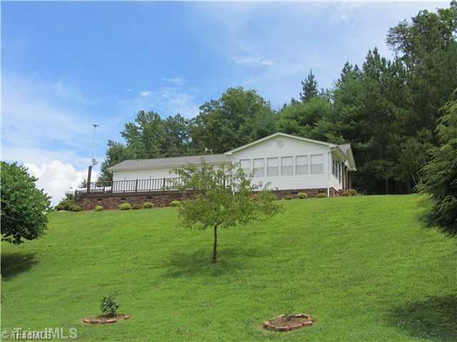 1210 Golf Trail Road Pine Hall, NC 27042 - Photo 1 of 7 Exterior Front.