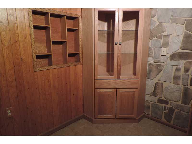 44 Profio Road McDonald, PA 15057 - Photo 17 of 24 Other. The downstairs hallway leads to the finished game room and large laundry and workshop areas.