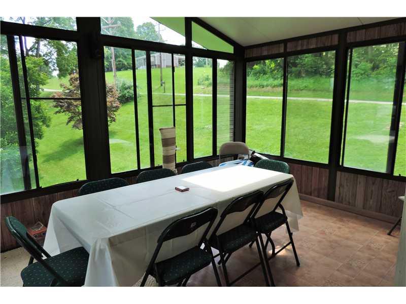 44 Profio Road McDonald, PA 15057 - Photo 20 of 24 Sunroom. Large 3 season room provides a wonderful enclosed space while still enjoying the view.