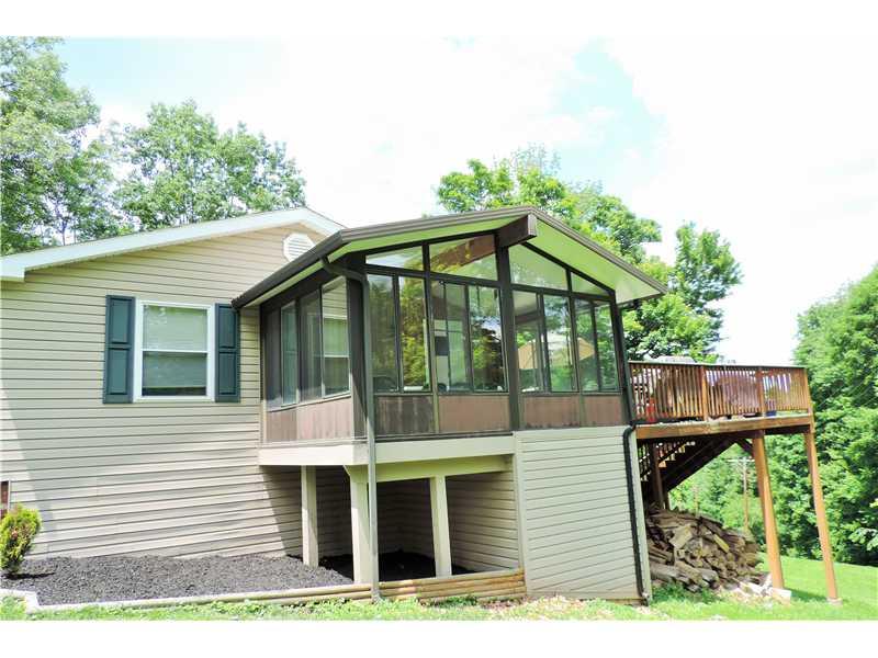 44 Profio Road McDonald, PA 15057 - Photo 21 of 24 Sunroom. Outside view the deck and sunroom.
