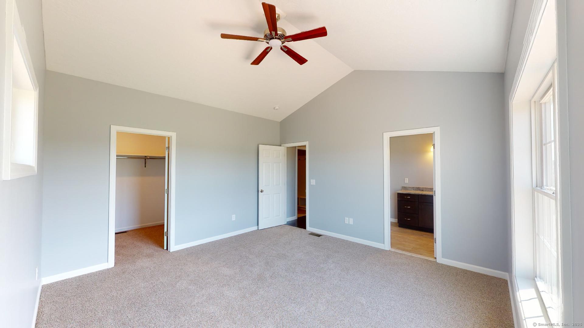 318 Capen Street Windsor, CT 06095 - Photo 17 of 37 a view of a room with a ceiling fan and a window