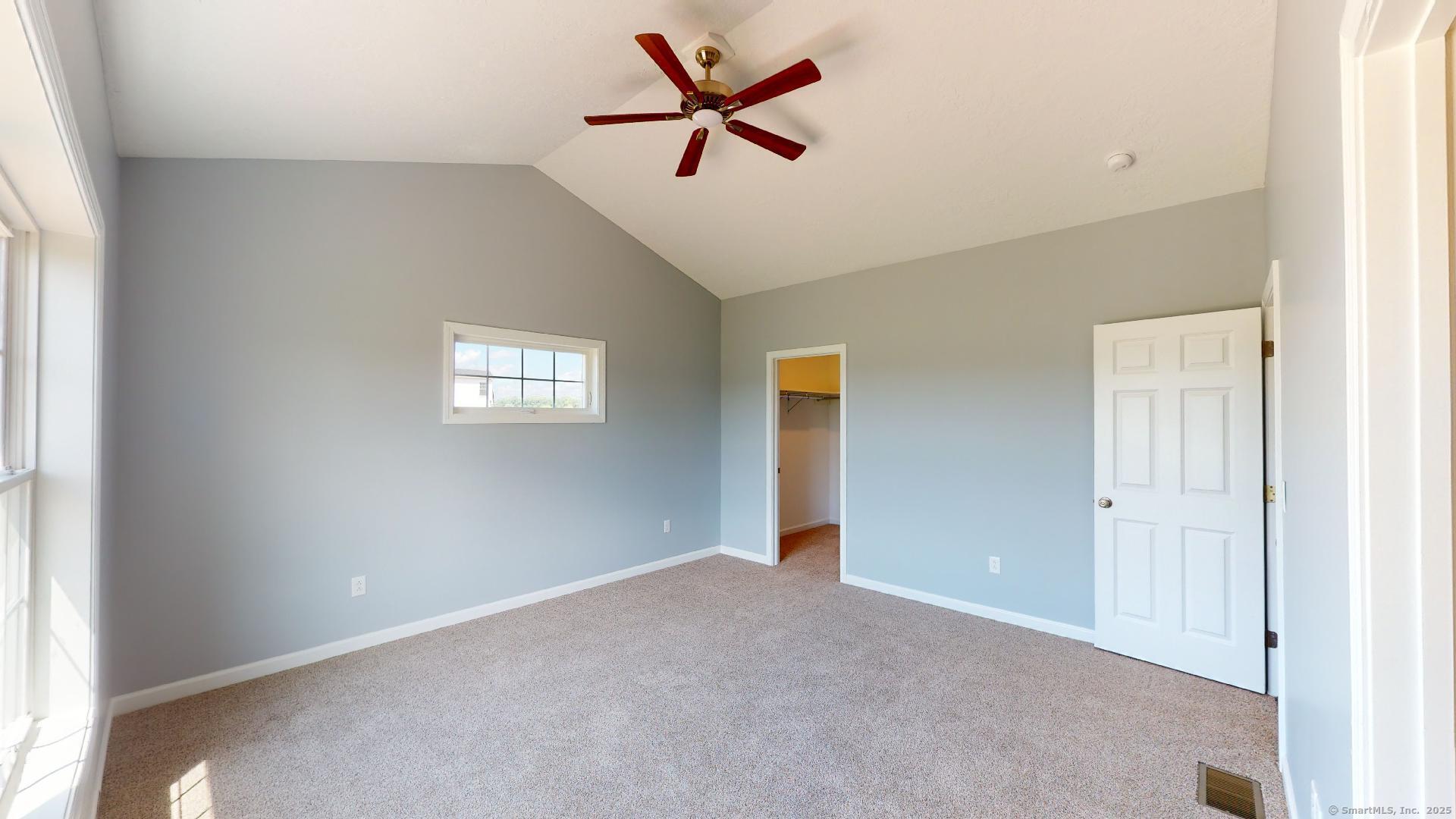 318 Capen Street Windsor, CT 06095 - Photo 19 of 37 an empty room with windows and fan