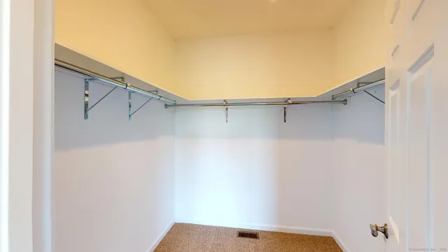 a view of small space with racks on the wall