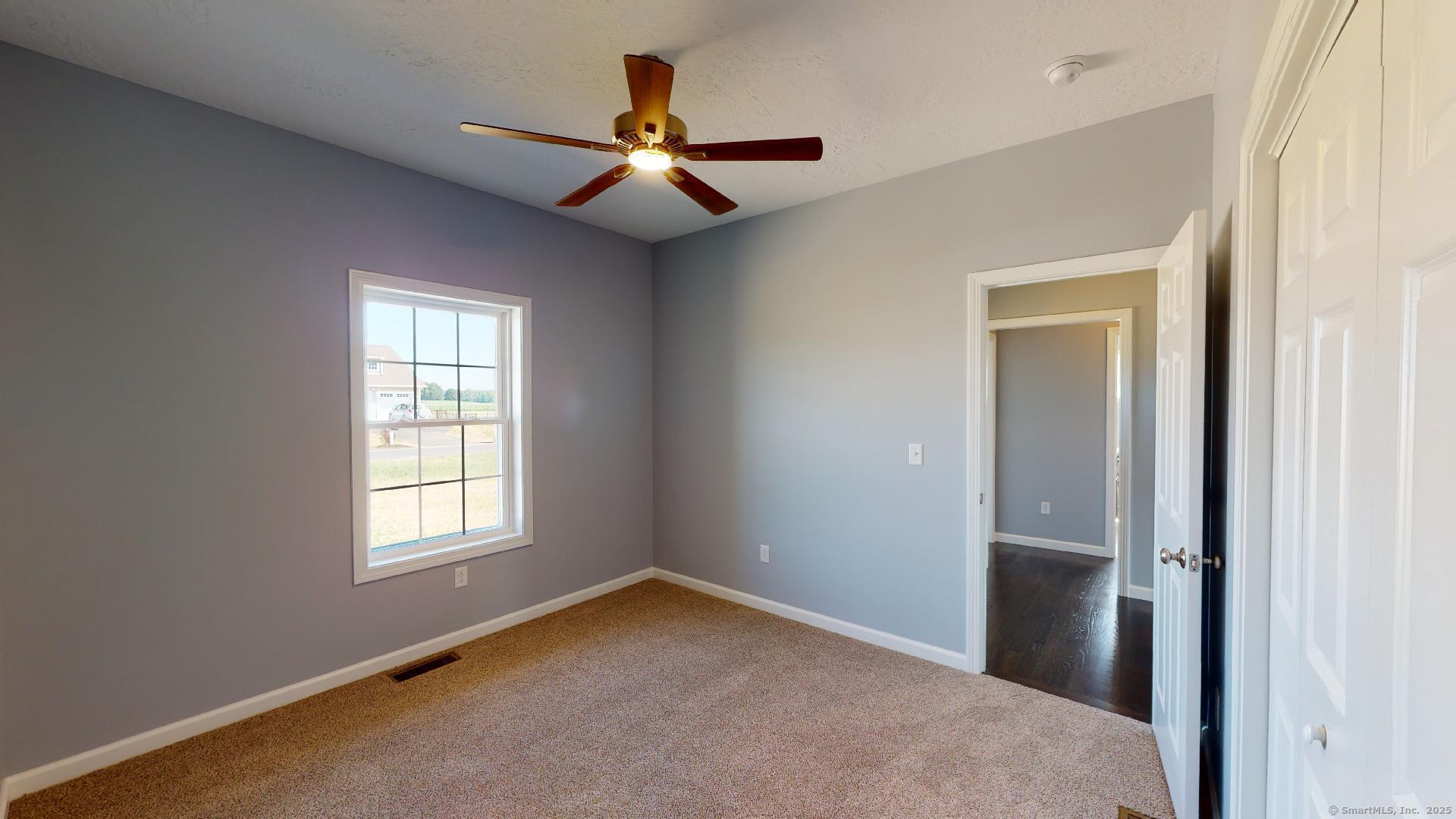 318 Capen Street Windsor, CT 06095 - Photo 23 of 37 wooden floor in an empty room with a window