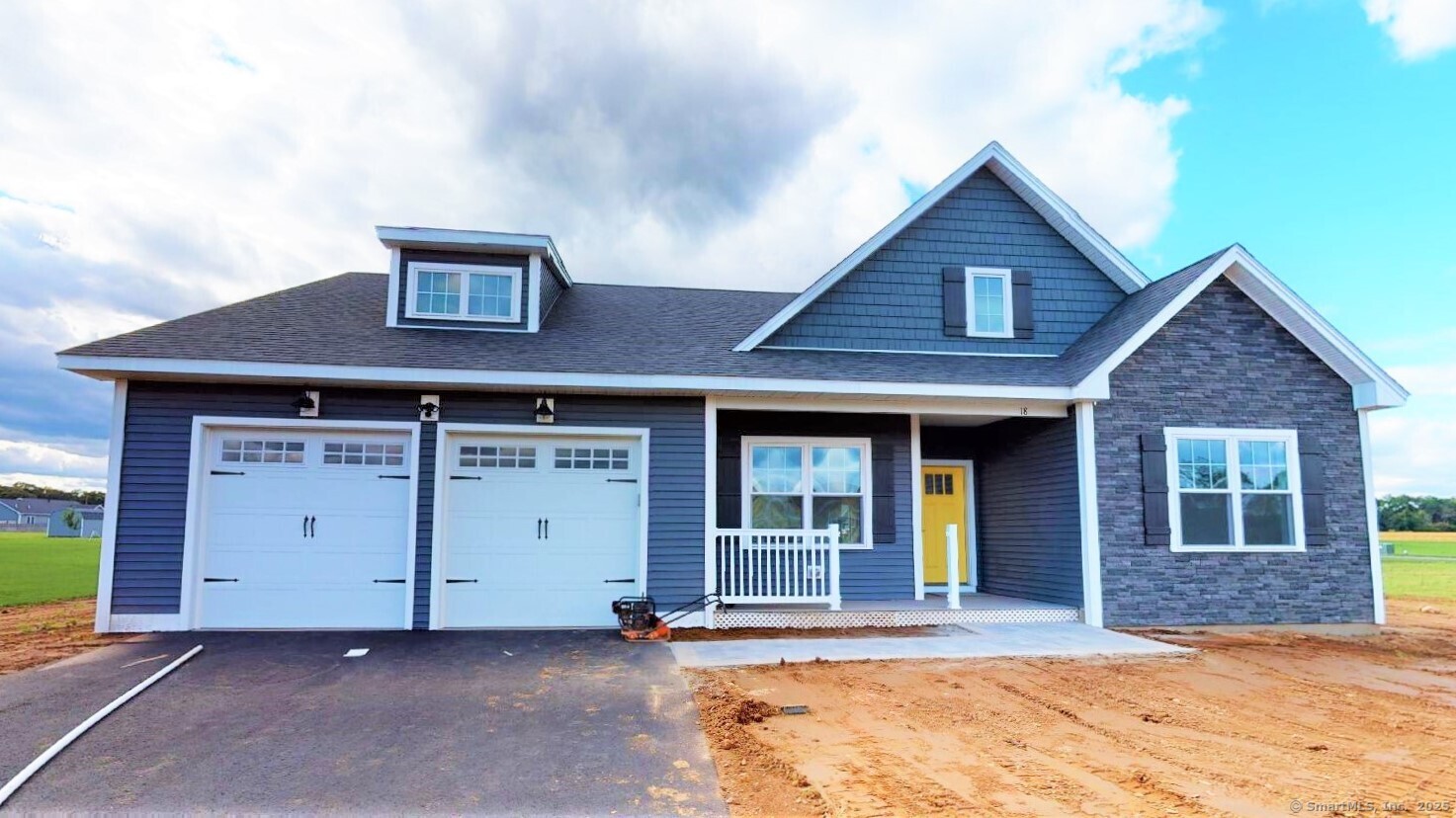 318 Capen Street Windsor, CT 06095 - Photo 36 of 37 a front view of a house with a yard