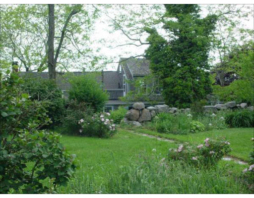 1935 Main Road Westport, MA 02791 - Photo 1 of 9 a view of backyard with green space