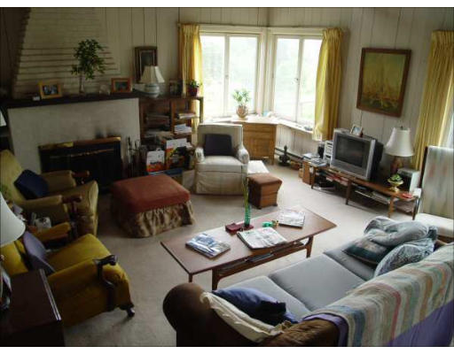 1935 Main Road Westport, MA 02791 - Photo 5 of 9 a living room with furniture and a flat screen tv