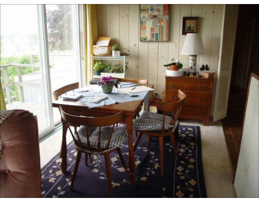 1935 Main Road Westport, MA 02791 - Photo 6 of 9 a dining room with furniture and window