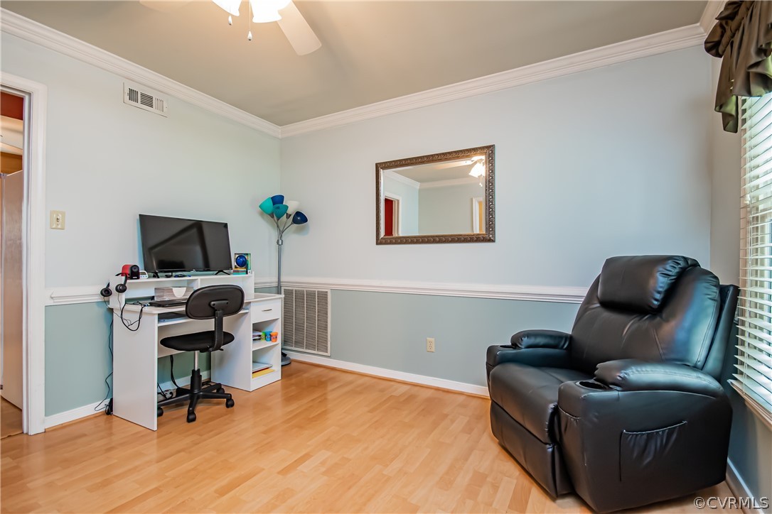 5501 Chestnut Bluff Road Midlothian, VA 23112 - Photo 13 of 33 a work room with furniture and wooden floor
