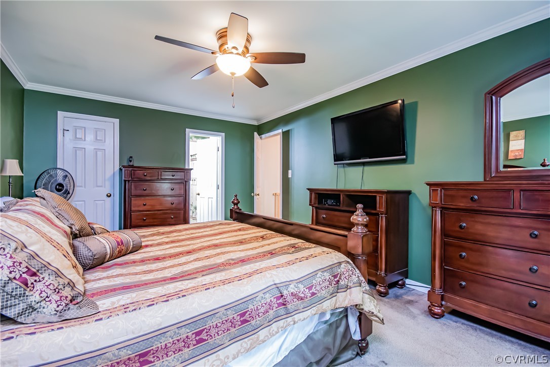 5501 Chestnut Bluff Road Midlothian, VA 23112 - Photo 17 of 33 a bedroom with a bed and a flat screen tv