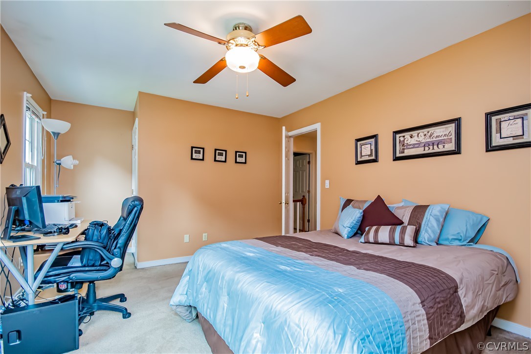 5501 Chestnut Bluff Road Midlothian, VA 23112 - Photo 21 of 33 a bedroom with a bed a desk and chair