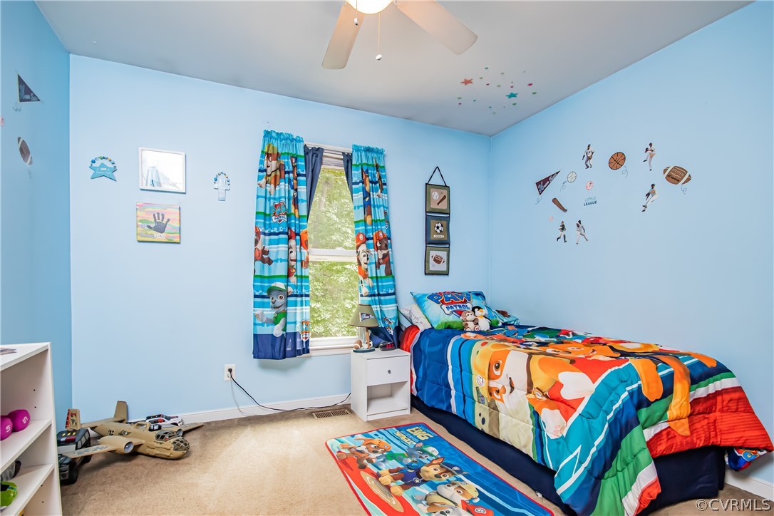 5501 Chestnut Bluff Road Midlothian, VA 23112 - Photo 22 of 33 a bedroom with toys and a couch