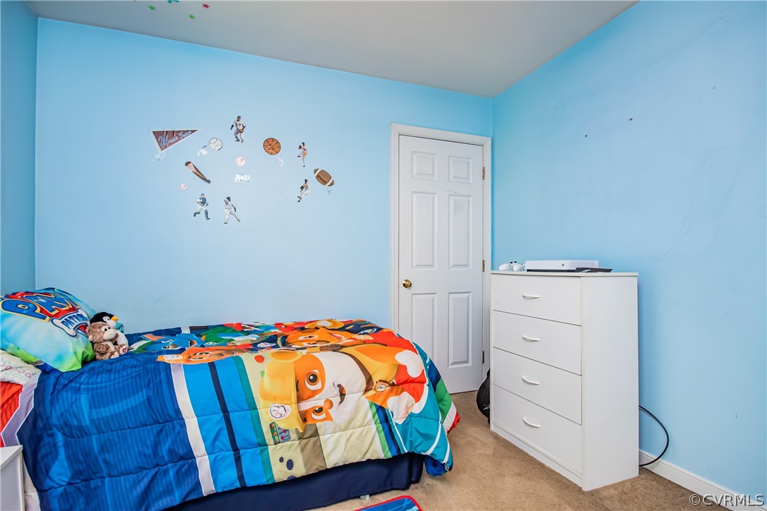 5501 Chestnut Bluff Road Midlothian, VA 23112 - Photo 23 of 33 a bedroom with a bed and a window