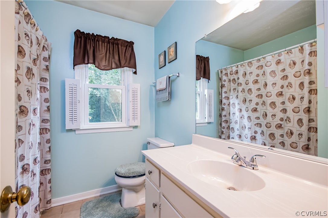 5501 Chestnut Bluff Road Midlothian, VA 23112 - Photo 27 of 33 a bathroom with a sink toilet and shower
