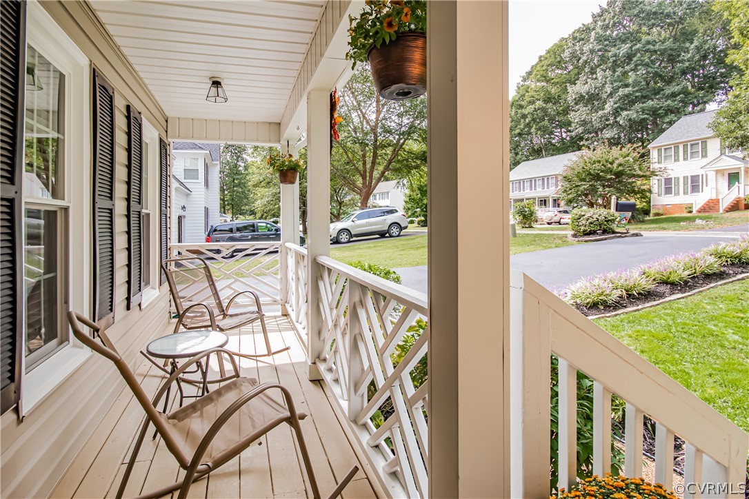 5501 Chestnut Bluff Road Midlothian, VA 23112 - Photo 5 of 33 a view of a porch with furniture and garden