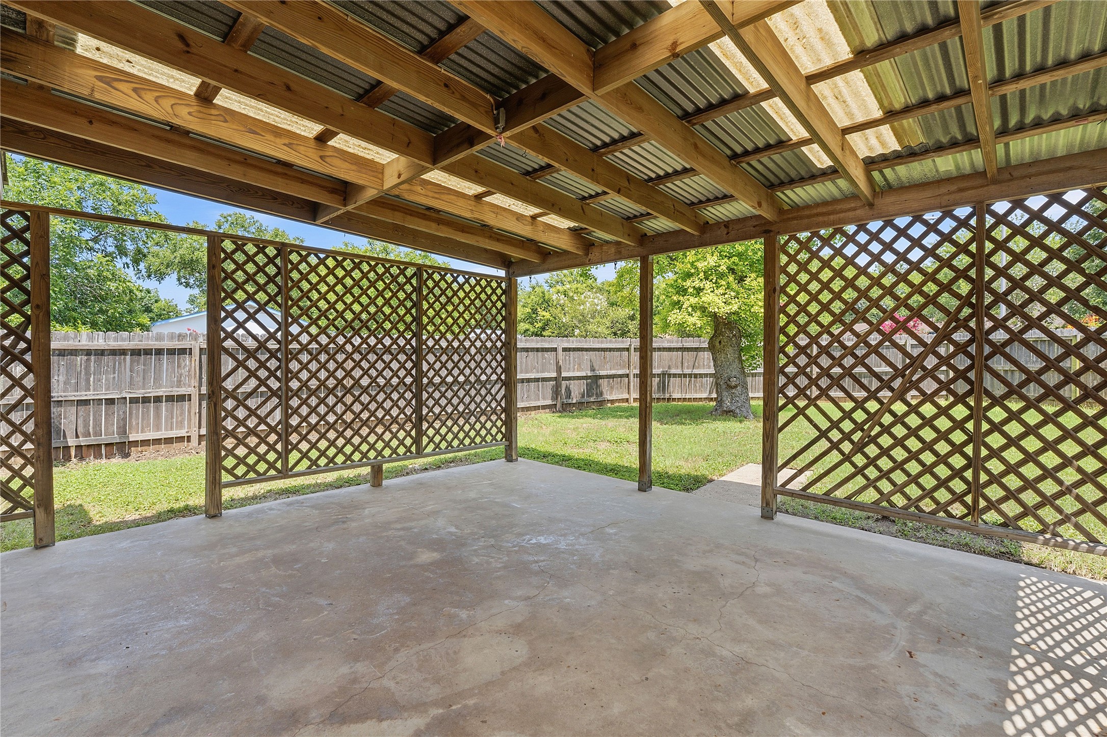 6205 Shadow Bend Austin, TX 78745 - Photo 26 of 31 A spacious covered patio provides an ideal setting for outdoor enjoyment.