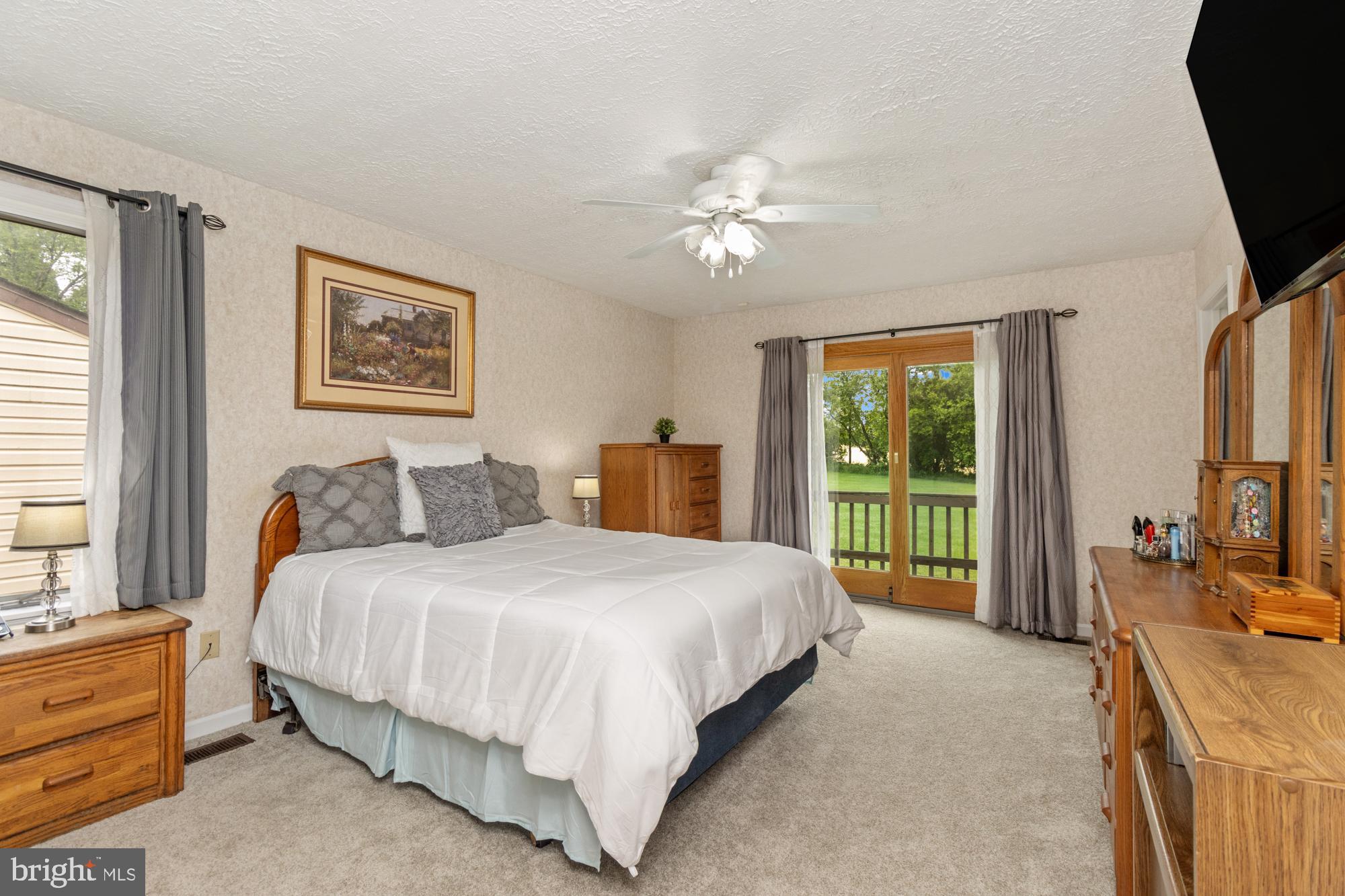 4116 Mt Carmel Road Upperco, MD 21155 - Photo 23 of 60 Primary bedroom with sliders to deck