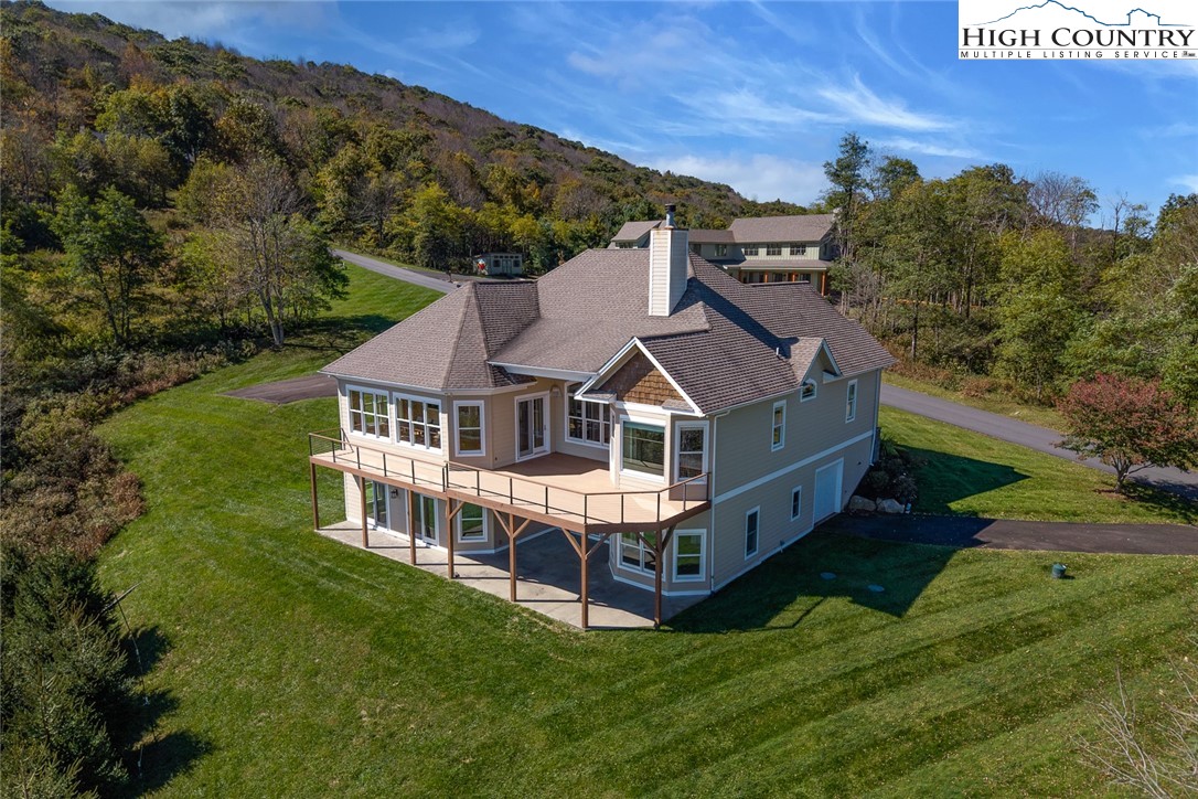 175 Boone Ridge Lane Boone, NC 28607 - Photo 1 of 47 an aerial view of residential houses with outdoor space and trees