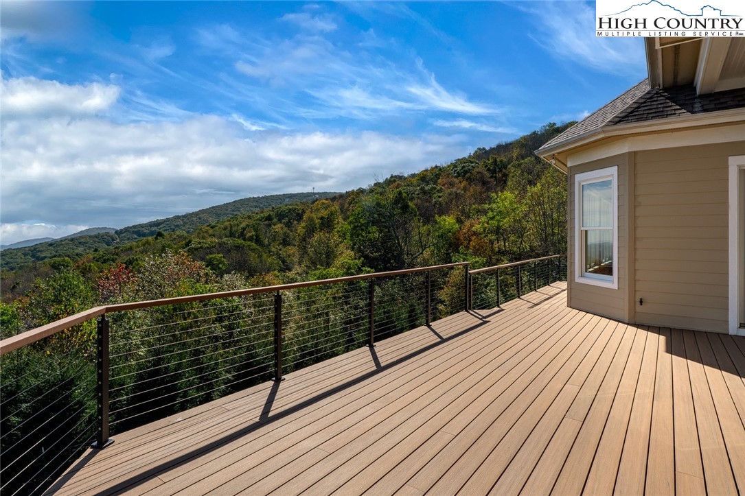 175 Boone Ridge Lane Boone, NC 28607 - Photo 10 of 47 a view of balcony with wooden floor and fence