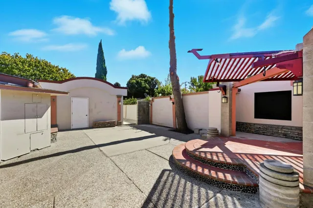 a view of a terrace with sitting area