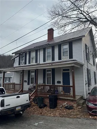 a front view of a house with balcony