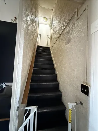 a view of entryway with a front door