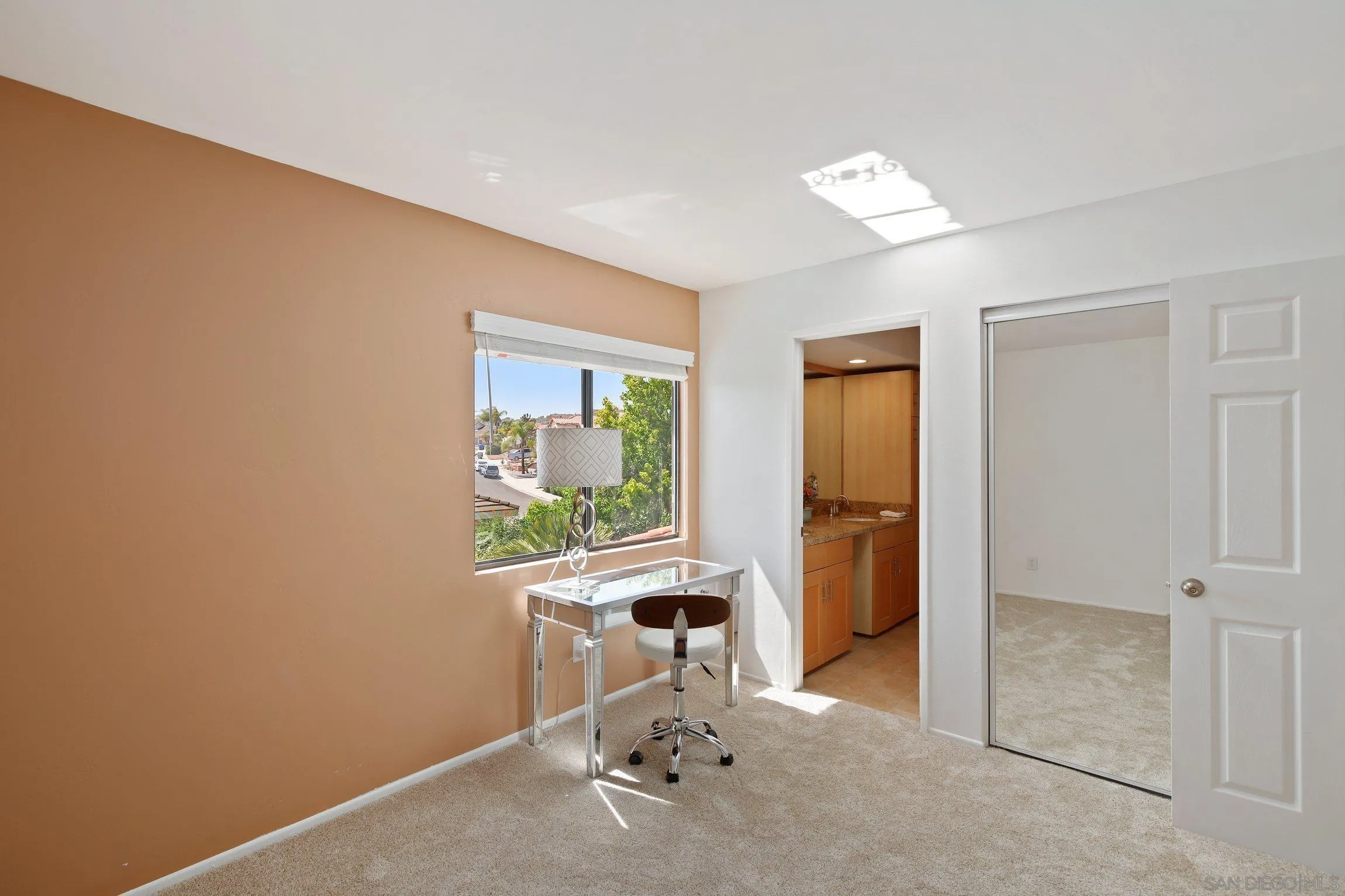 5080 Frazee Road Oceanside, CA 92057 - Photo 23 of 44 a view of a hallway with workspace