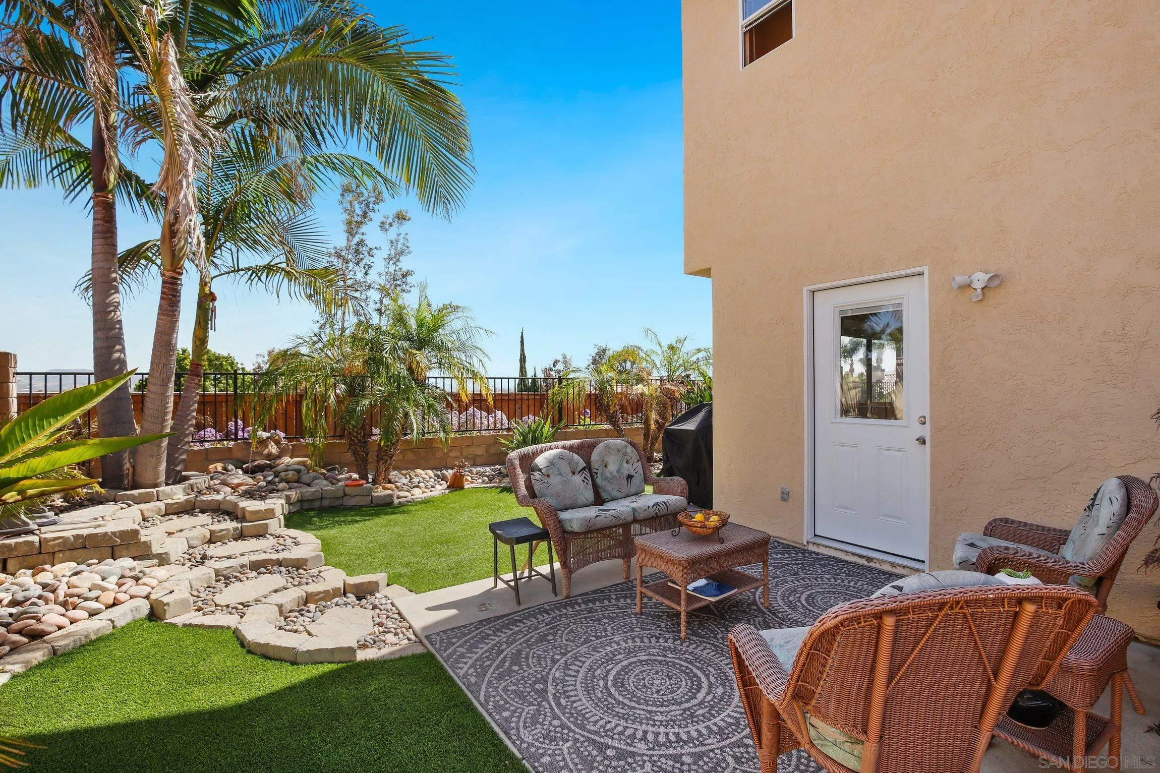 5080 Frazee Road Oceanside, CA 92057 - Photo 30 of 44 a view of a backyard with furniture