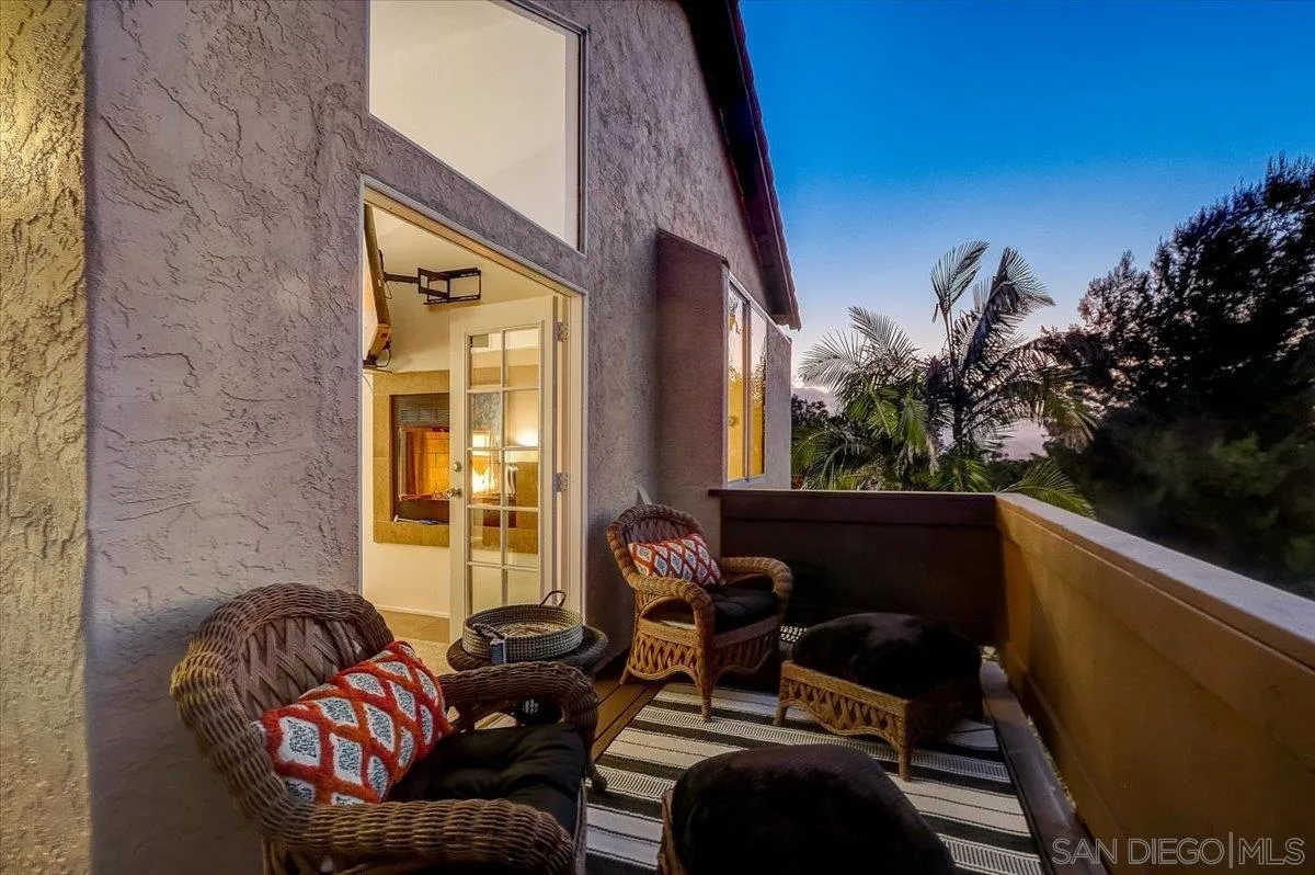 5080 Frazee Road Oceanside, CA 92057 - Photo 3 of 44 a living room with furniture and garden