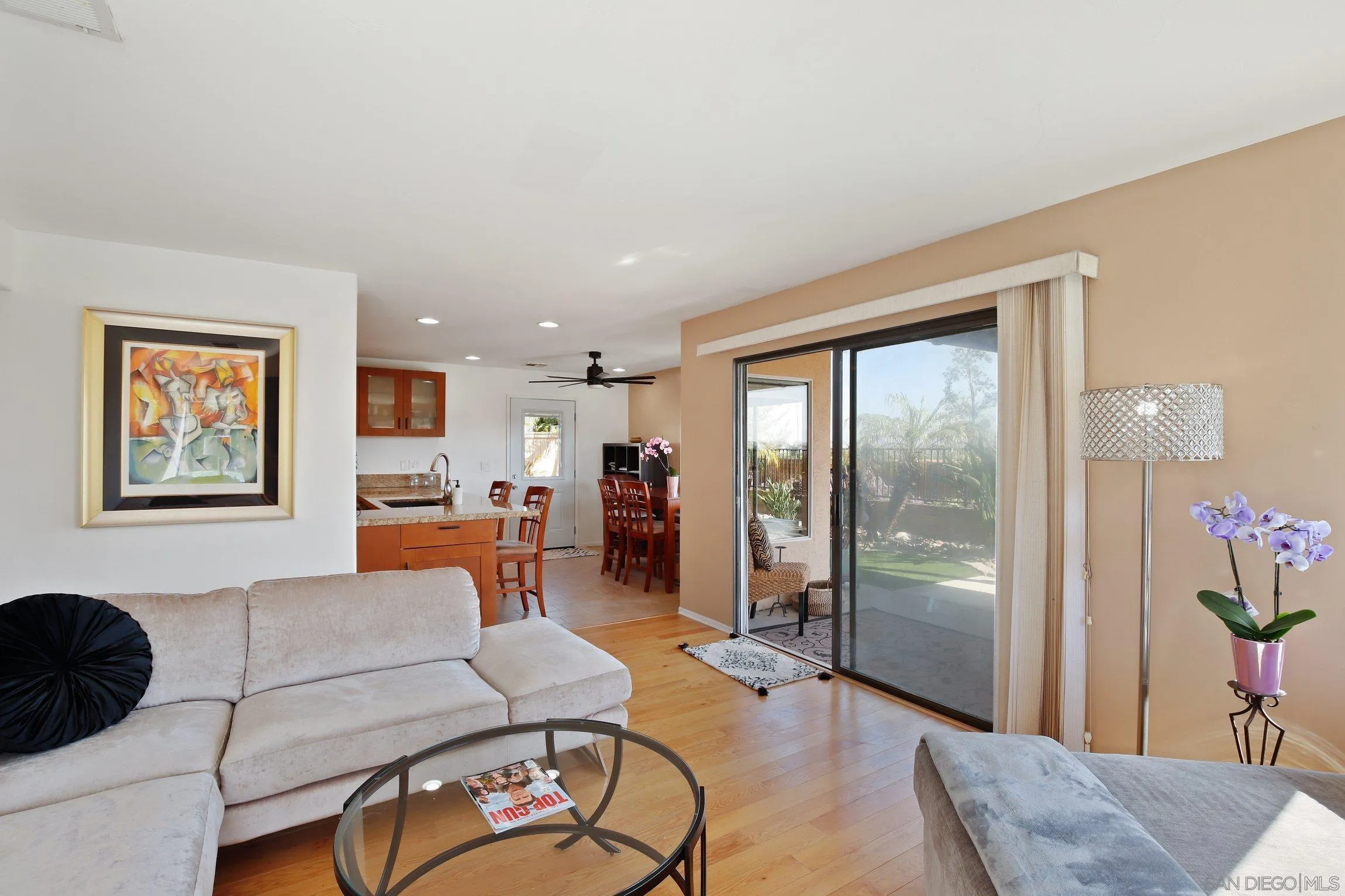 5080 Frazee Road Oceanside, CA 92057 - Photo 10 of 44 a living room with furniture and a large window