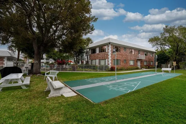 a view of a house with a big yard