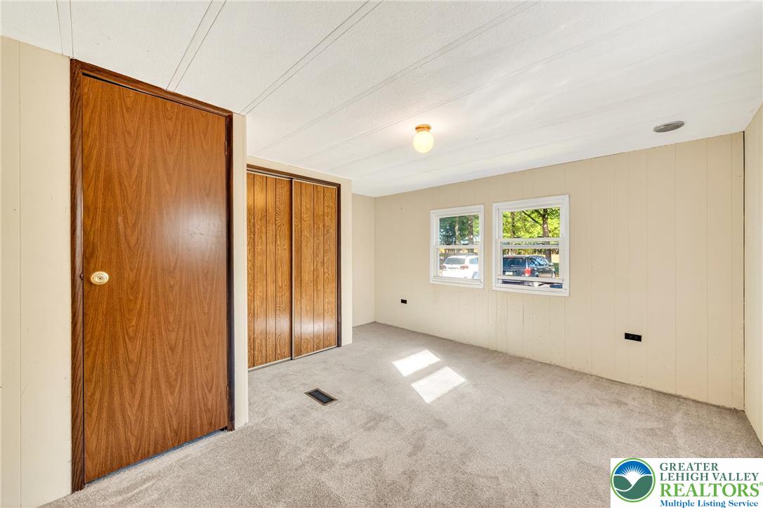 8220 Airport Road, Unit 4 Coatesville, PA 19320 - Photo 19 of 28 an empty room with windows